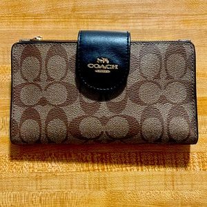 Coach wallet. Very spacious.